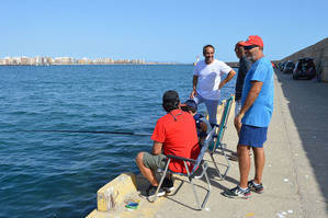 Ambiente familiar en el Faro de Poniente con el XLVII Concurso de Pesca Infantil de Feria